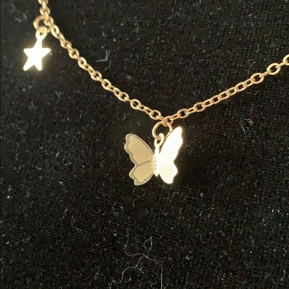 Gold tone butterfly and stars necklace - Picture 3 of 4